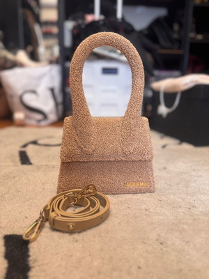 Jacquemus Le Chiquito Moyen bag in a textured boucle fabric with a warm camel/tan hue