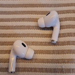 Bluetooth earbuds used with Lightning charging case