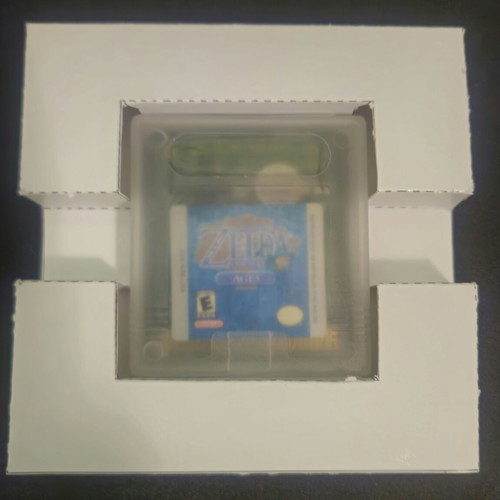 The Legend of Zelda Oracle of Ages Game Boy Color cartridge and manual