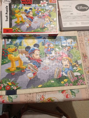 Disney puzzle 100 pieces like new for ages 5+