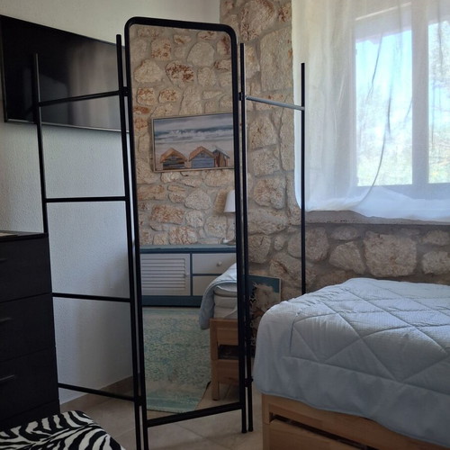 Metal room divider with full-length mirror and hanger, like new
