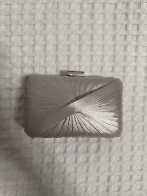 La Prairie silver evening bag new, hand-held