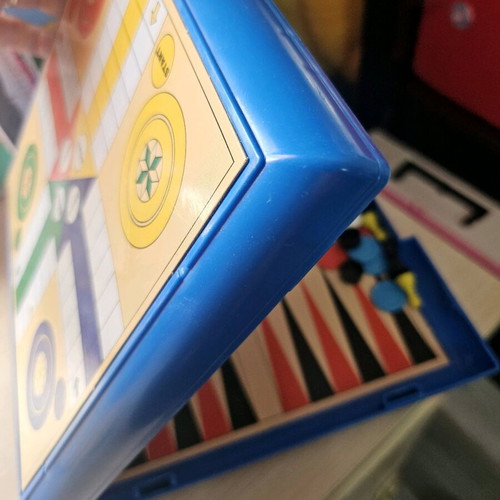 Portable multiple board game like new, closes like a suitcase