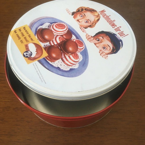 Metal tin used, round red with Munchmallows advertisement
