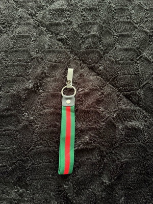 Keychain like new in red and green colors