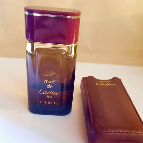 Must de Cartier vintage eau de toilette used with leather case