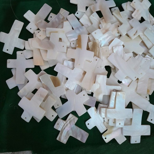 Lot of mother of pearls crosses like new, total 75