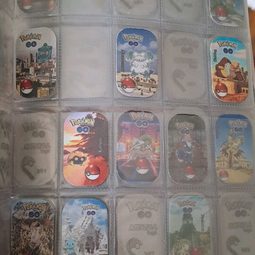 Pokemon Go 110 authentic metal tags like new