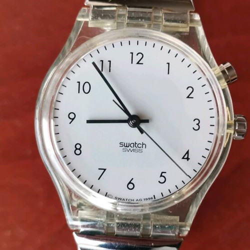 Swatch watch with illuminated dial like new