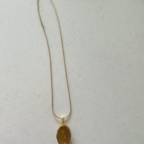 Necklace made of stainless steel like new, turquoise and gold tone