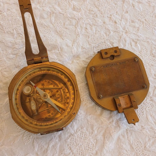 Vintage brass compass used with natural sine table