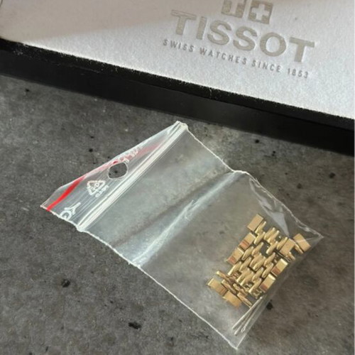 Tissot gold watch