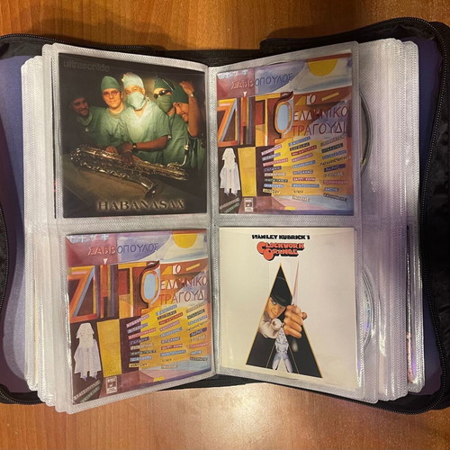 Collection of 64 CDs with carrying case, classical jazz entechno