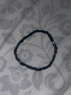 Men's bracelet with black beads like new, unworn