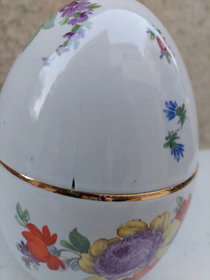 Decorative ceramic Easter egg used with flowers