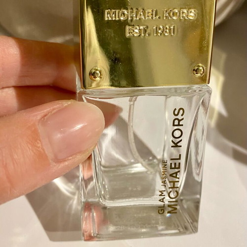 Michael Kors Glam Jasmine cologne bottle used 30ml