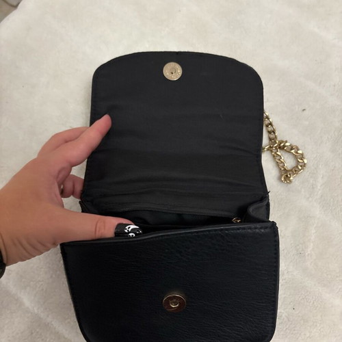 Shoulder bag with gold stars and chain like new, black