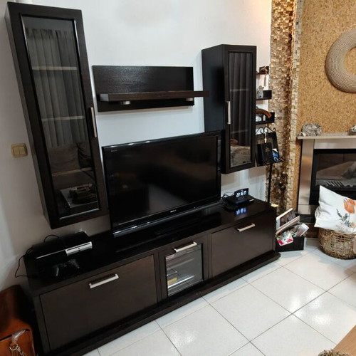 Living room unit used with lower cabinet, wall columns, and shelves