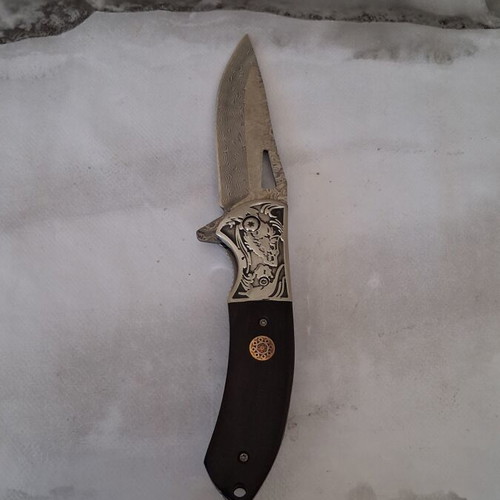 Folding knife from Damascus steel new
