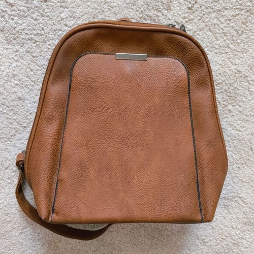 Brown backpack like new with leather texture and two compartments