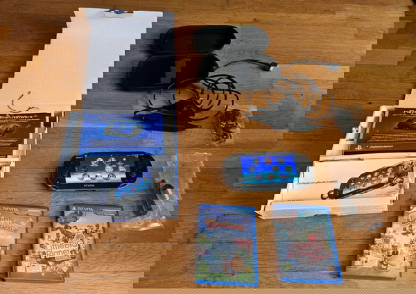 Ps vita 1000 oled σε τέλεια κατάσταση με ζελατίνη στην οθόνη σε συλλεκτική κατάσταση