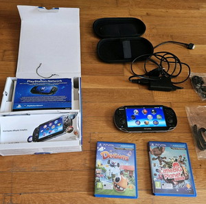 Ps Vita 1000 OLED в перфектно състояние с протектор на екрана в колекционерско състояние