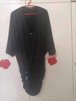 Mini dress like new, black, with draped detail and batwing sleeve
