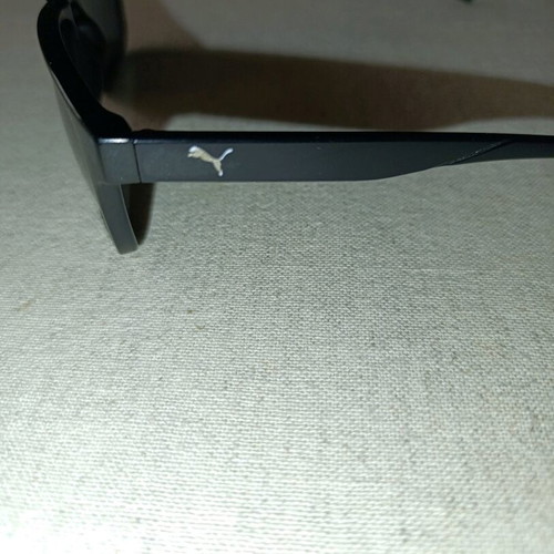 Puma sunglasses like new, black