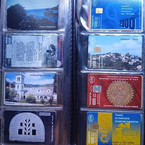 Phone cards like new, set of 48 in album 1