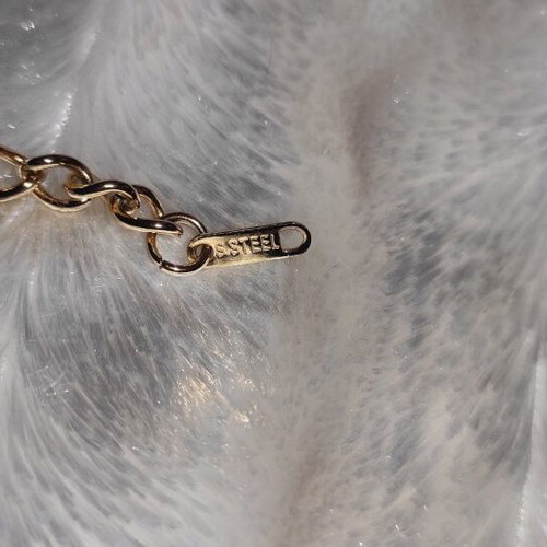 Women's stainless steel hand chain and earrings new, gold tone with pink stones