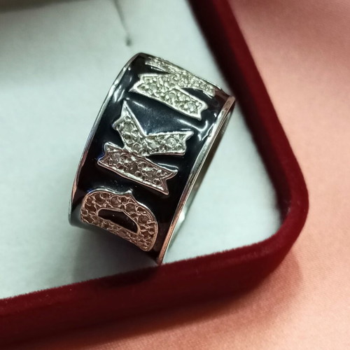 DKNY ring with enamel like new, alpaca and zircon stones