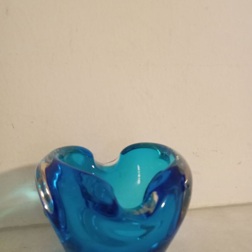 Blue glass ashtray like new, can be used as candle holder