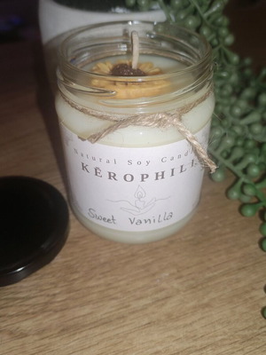 Handmade spring soy candle with sweet vanilla scent like new