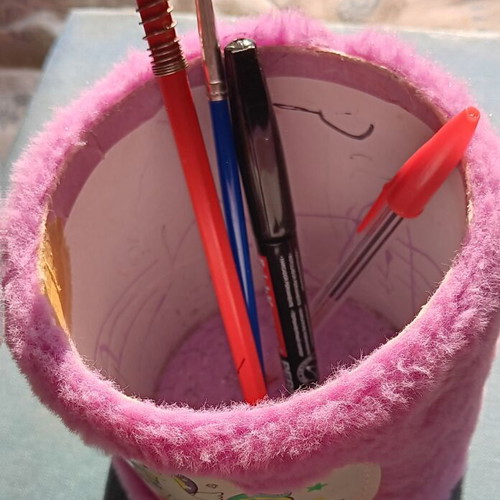 Fluffy pink pencil holder with unicorn design