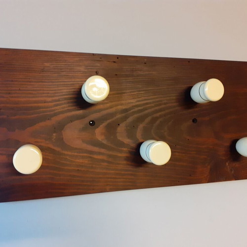 Wooden wall hanger with handles from old barber shaving brushes