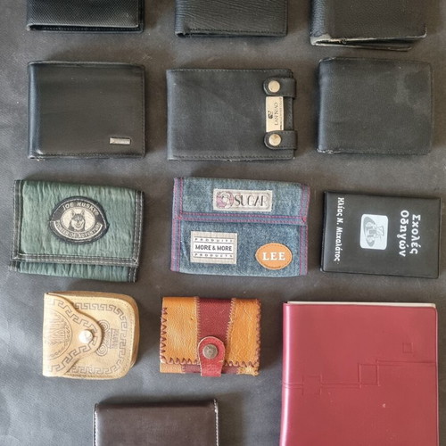 Set of 13 used wallets and cases