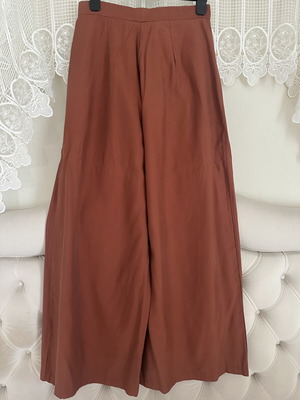 Vassia Kostara pants used, size large, terracotta color