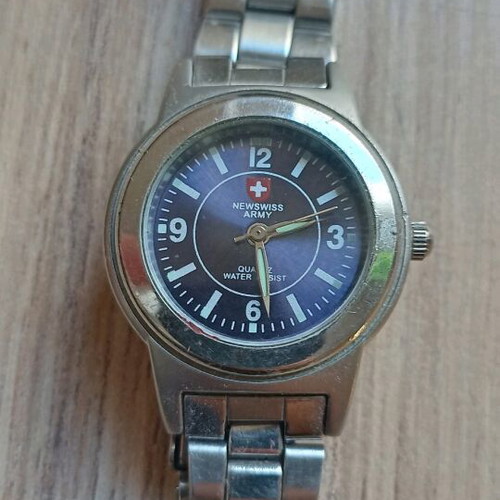Swiss miniature battery watch like new