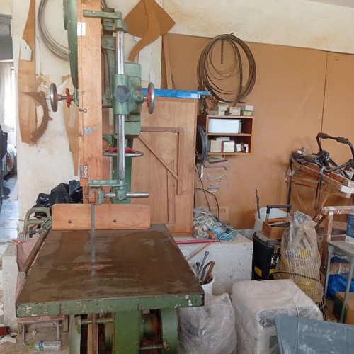 Bandsaw with planer, table, and bench used, includes tools