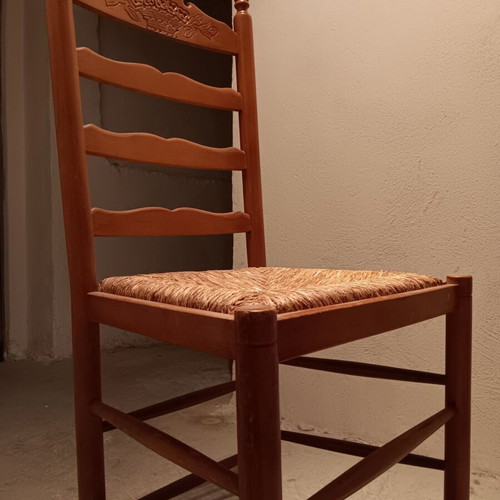 Wooden chair used with cane seat and embossed wood