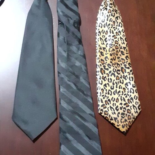 Three women's ties like new, two black and one tiger print
