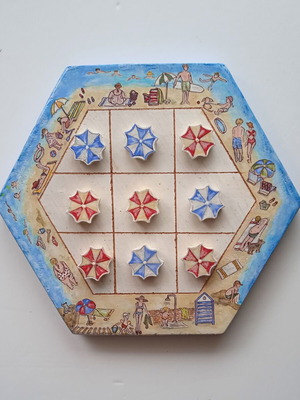 Ceramic handmade tic-tac-toe new on hexagonal terracotta tile