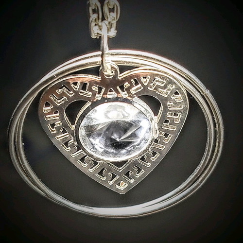 Heart pendant with crystal like new, silver steel
