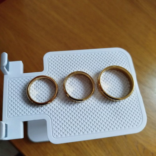 Set of new stainless steel rings, two women's and one men's