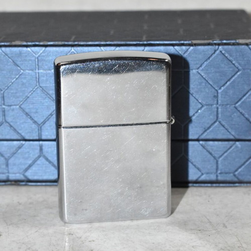 Zippo chrome lighter with sailboat design used