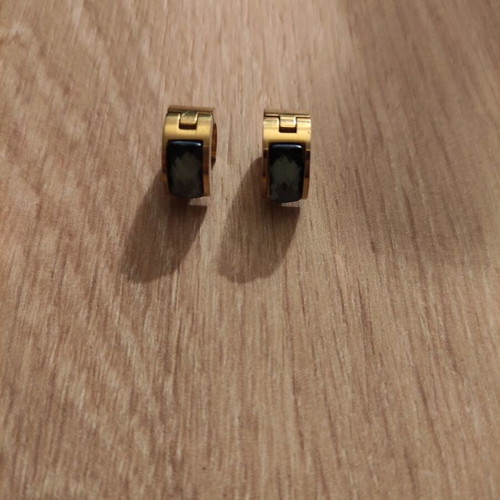 Women's modern earrings, gold color