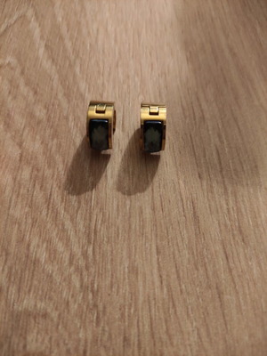 Women's modern earrings, gold color
