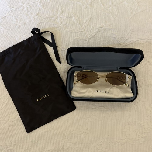 Gucci women's sunglasses GG1802S 005 with gold metal frame and brown lenses new