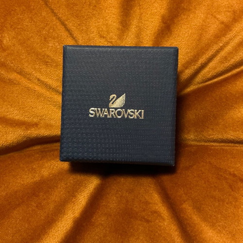 Swarovski lion charm like new, silver and gold