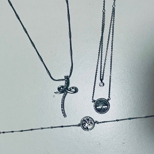 Silver cross, necklace and bracelet set like new